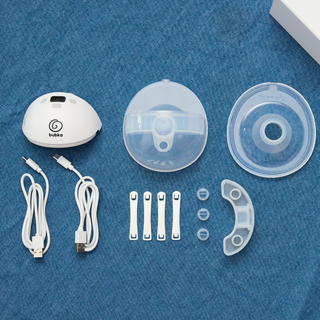 Bubka Move parts set including a white device, cables, and clear components on a blue textured surface.